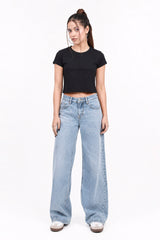 Womenlight blue jeans on a white background.black crop top, black crop top women, women's black crop top, black top for women, trendy black crop top, stylish black crop top, casual black crop top, fitted crop top, cropped top women, sleeveless black top, black fashion top, women's fashion top, ladies black top, black crop tank top, summer crop top, trendy women's clothing, casual women's wear, street style outfit, black crop top outfit, blue jeans outfit.
