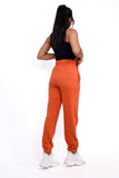 Orange joggers,orange high waisted cotton joggers, high waisted joggers, casual wear joggers, comfortable joggers, breathable joggers, stylish joggers, women's joggers, versatile joggers, premium joggers